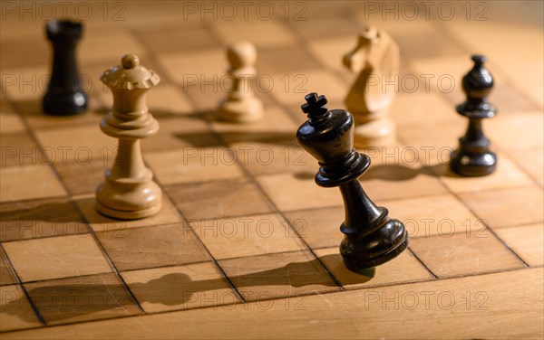 Chessboard with wooden chessmen