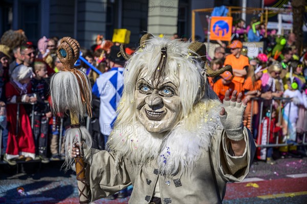 Masked woman with mask, Carnival parade of the Wey Guild on Rosenmontag