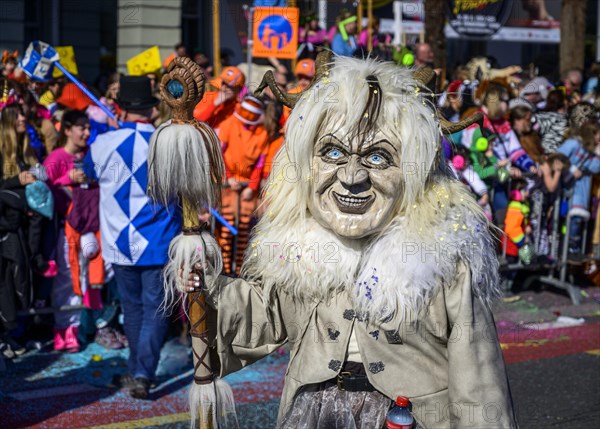 Masked woman with mask, Carnival parade of the Wey Guild on Rosenmontag