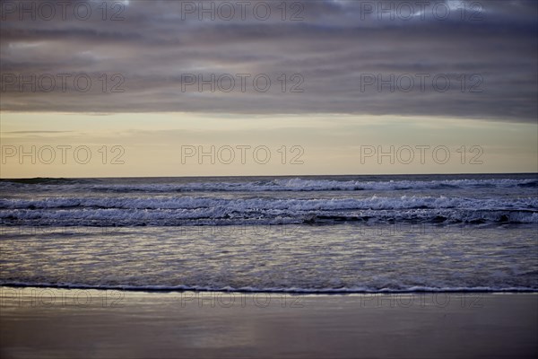 Running waves on the sandy beach