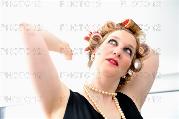 Woman with curlers