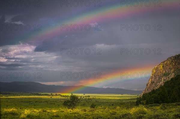 Double rainbow on the steppe after raining