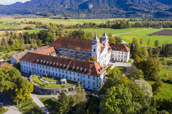 Aerial view of Schlehdorf Monastery with St. Tertulin Parish Church at Lake Lake Kochel