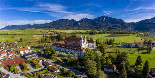 Aerial view of Schlehdorf Monastery with St. Tertulin Parish Church at Lake Lake Kochel