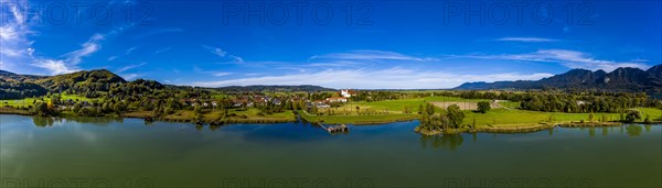 Aerial view of Schlehdorf Monastery with St. Tertulin Parish Church at Lake Lake Kochel