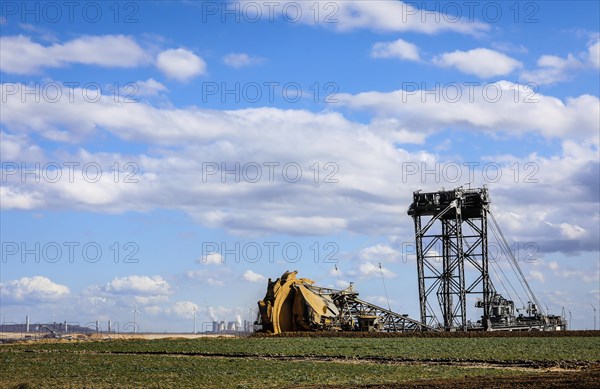 Bucket-wheel excavator wheel excavator in the RWE opencast lignite mine Garzweiler excavates at the demolition edge near Keyenberg