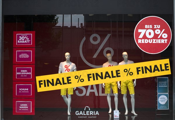 Discount battle in shop window