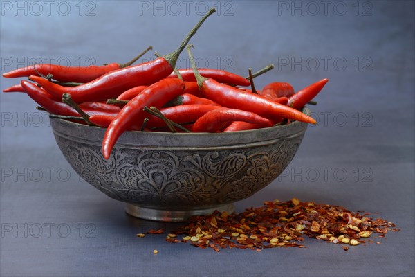 Chilli peppers in shell and chilli flakes