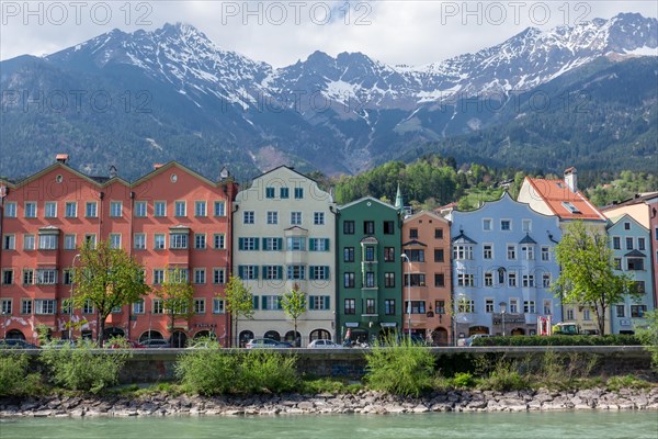 Colourful buildings Mariahilf along the river Inn