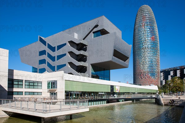 Skyscraper Torre Agbar with the museum Museu del Disseny de Barcelona