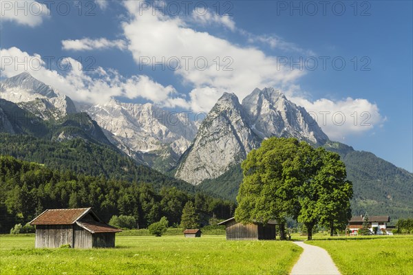 Hay barns at Hammersbach hiking trail towards Wetterstein range
