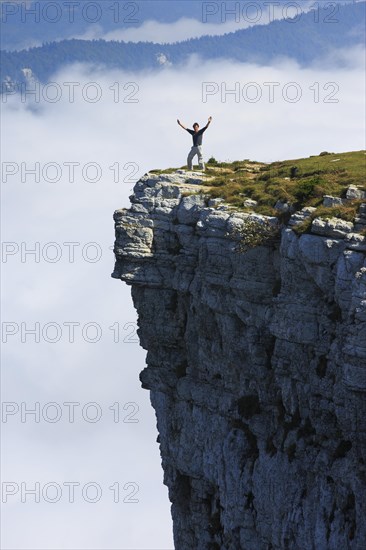 Man standing edge of the Creux du Van
