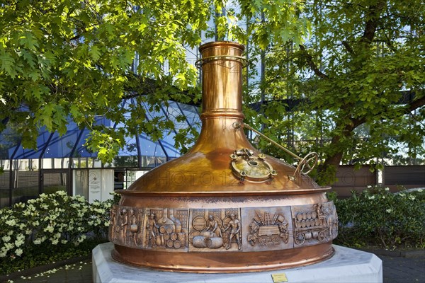 Artistically designed brew kettle in front of the administration of Warsteiner Brauerei
