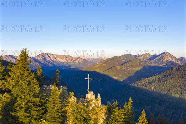 Summit cross on the mountain Vogelsang at Sudelfeld near Bayrischzell