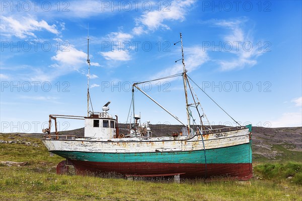 Shipwreck in barren landscape