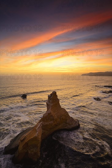 Evening mood over the rock Catedral at Playa Supay