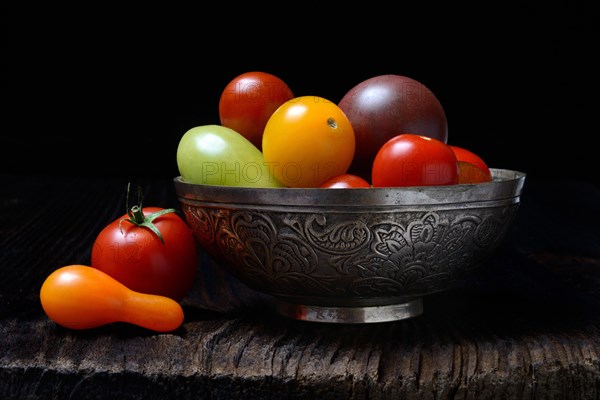 Shifted cherry tomatoes in peel