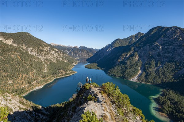 Two hikers looking into the distance