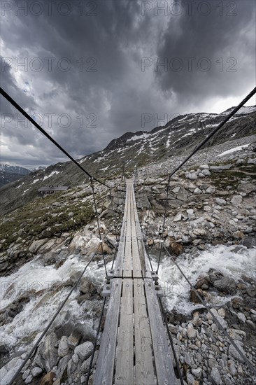 Suspension bridge over torrent at the Olpererhuette