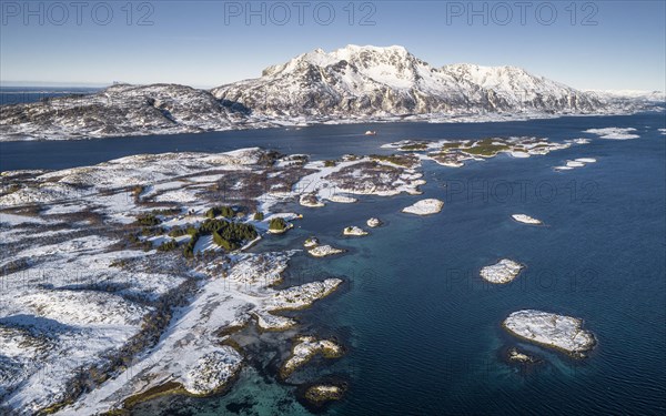 Winter archipelago islands in turquoise sea