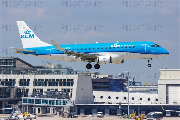 An Embraer ERJ175 of KLM cityhopper with the registration PH-EXM at Stuttgart Airport