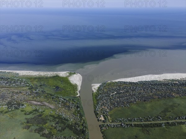 Aerial view on the distributary channel Danube river flowing into the Black Sea