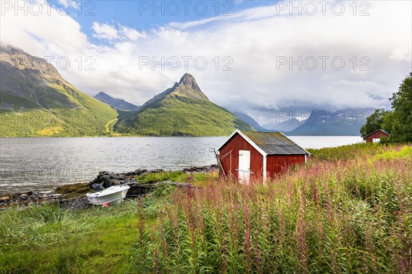 Boat cabins by the fjord