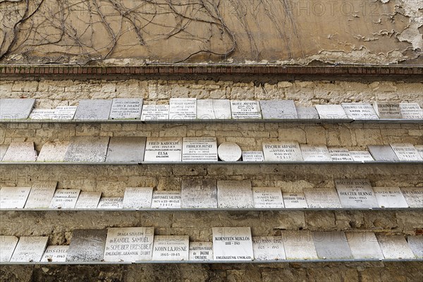 Wall with plaques commemorating the murdered Jews and the Holocaust