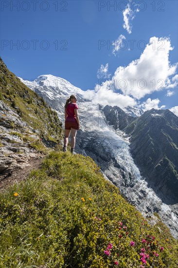 Hiker looking at mountain landscape
