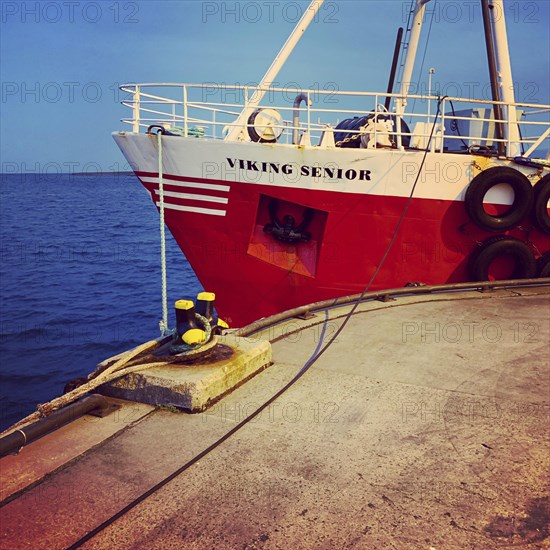 Ship is moored at the port of Orkney