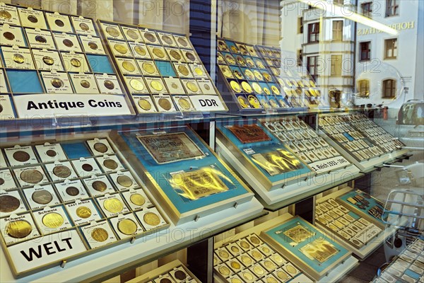Showcase with different coin collections