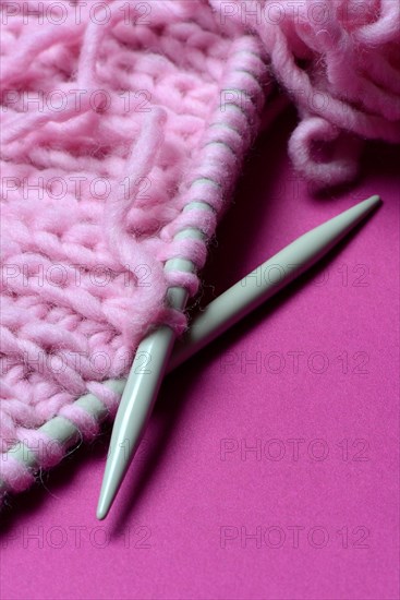 Knitted wool with knitting needles