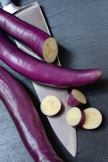 Japanese eggplant with knife