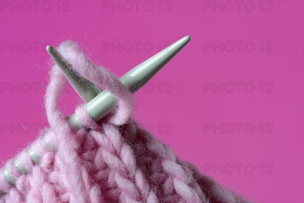 Knitted wool with knitting needles
