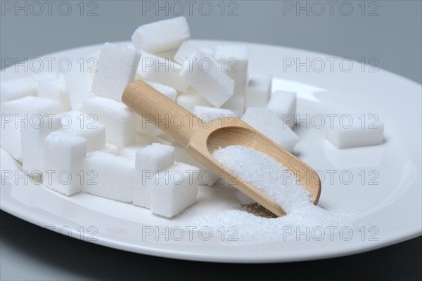 Sugar cubes on plate