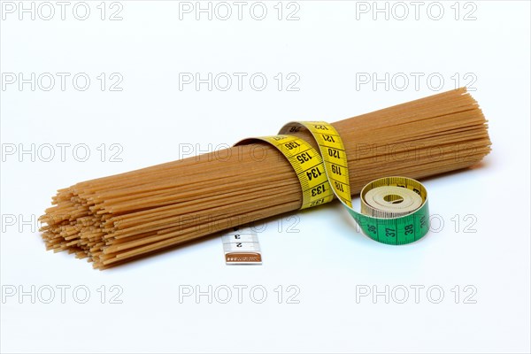 Spaghettis with measuring tape