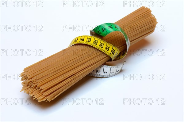 Spaghettis with measuring tape