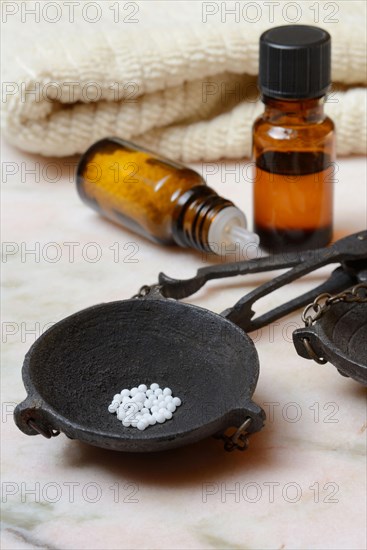 Globules in weighing pan