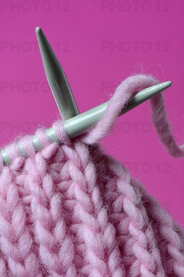 Knitted wool with knitting needles