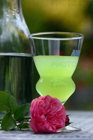 Glass of Absinthe with water carafe