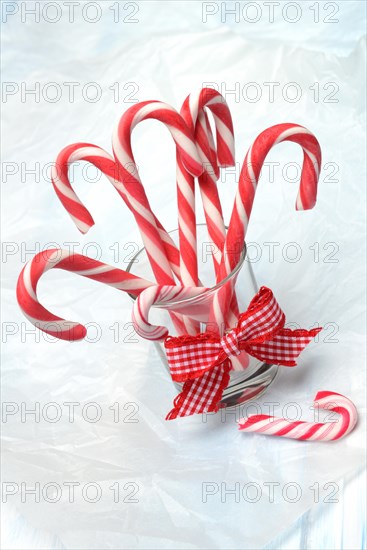 Candy canes in glass