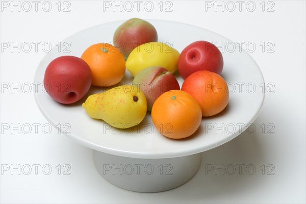 Marzipan fruits on decorative plate