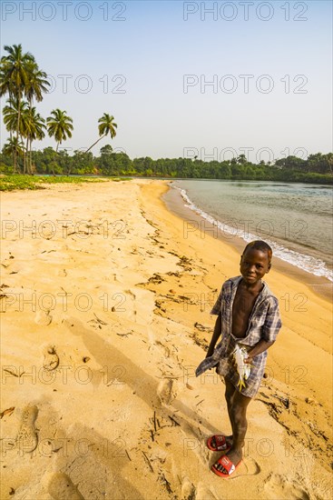Young boys posing on a beach