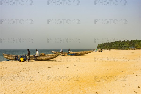 Fishing boats on a beach in Robertsport