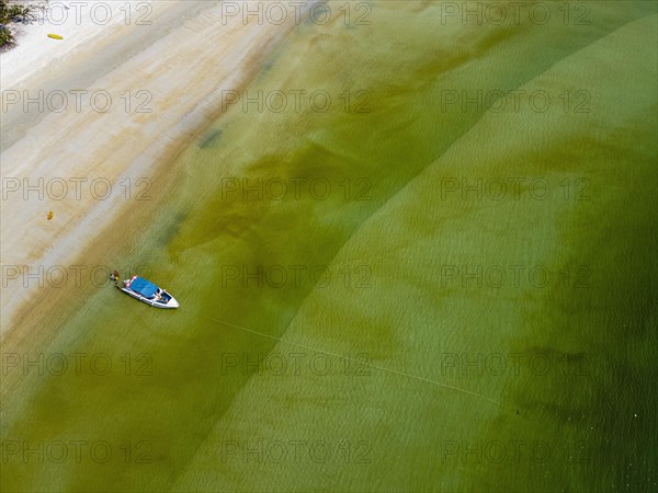 Aerial of a White sand beach on Thel Ni Aw island