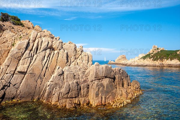 Rocky coast at Cap Camarat with the island Rocher des Portes