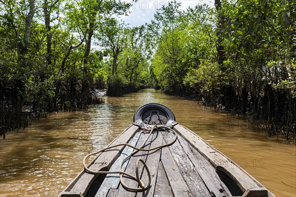 Rowing through a small water channel