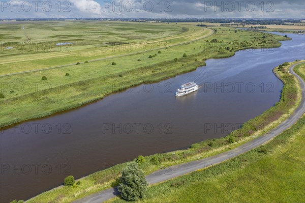 Drone shot with landscape at the Leyhoerner-Sieltief and tourist ship