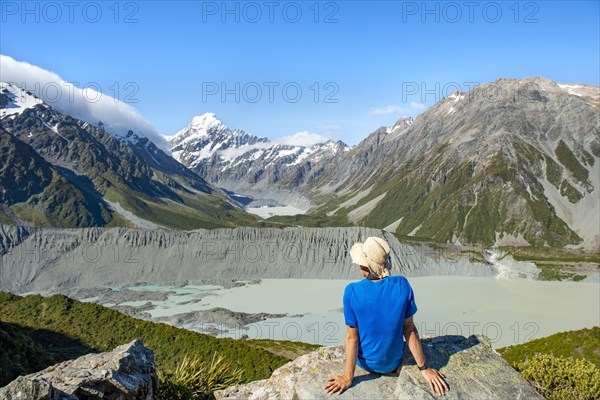 Hiker sitting on a rock