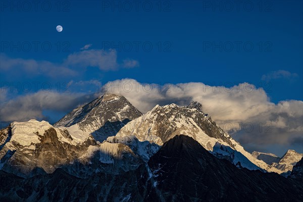 View in the evening light from Renjo La Pass 5417m to the east on Himalaya with Mount Everest